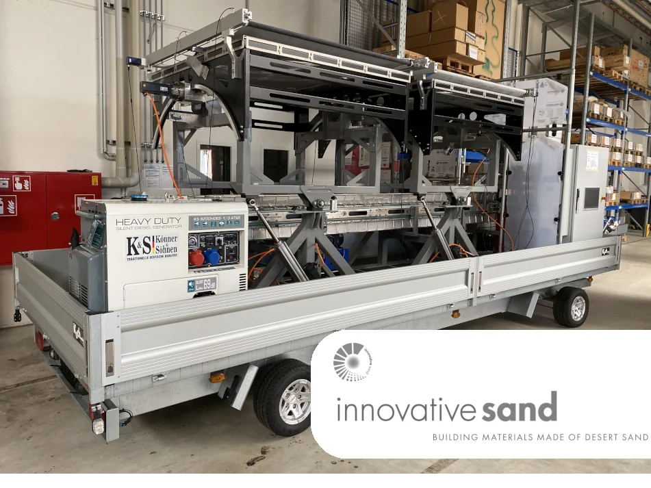 Ein Foto einer Sondermaschine die aus Sonnenlicht Bausand herstellt.